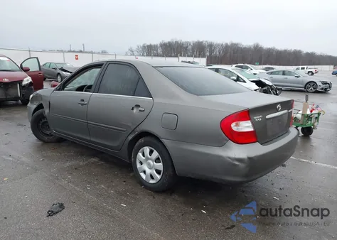 2004 Toyota Camry Le z USA, uszkodzony, nr VIN 4T1BE32K74U829796